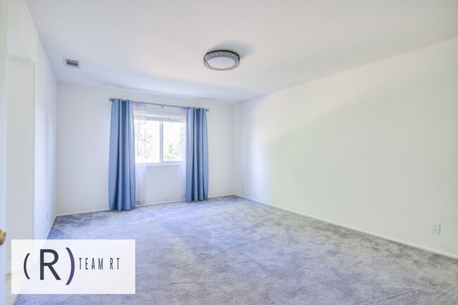 Building Photo - A Captivating and Charming 2 Story Home Ne...