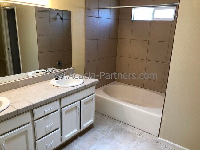 Building Photo - Three Bedroom/Two Bath Home