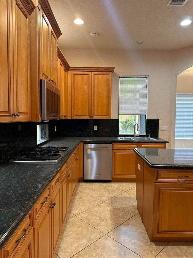 Building Photo - 10345 Medicis Pl