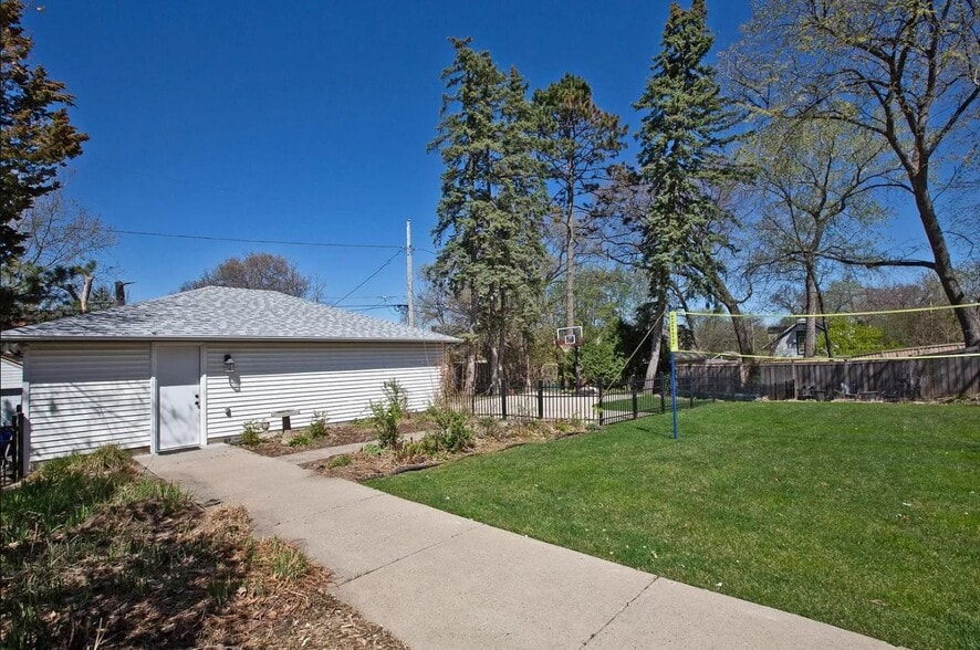 Parking available on cement pad off-street for additional fee - 1317 Summit Ave