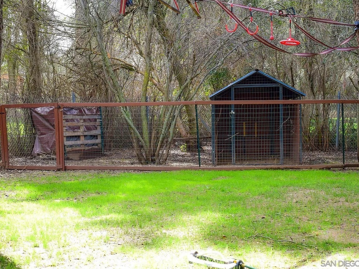 chicken coop and chicken run - 7627 Pine Blvd