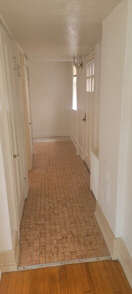 Hallway leading to bathroom and nook - 6008 8th Ave