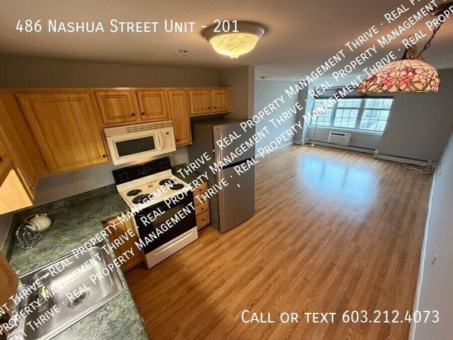 Building Photo - 486 Nashua St