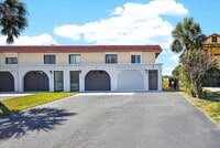 Building Photo - 1 N Ocean Palm Villas