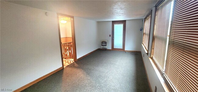 Building Photo - 9090 Radcliffe Rd