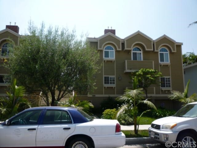 Trees in front of the building and lined across the street - 3647 Jasmine Ave