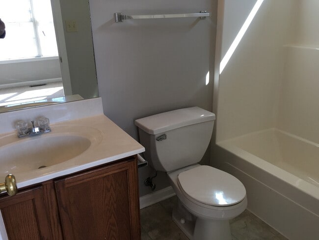 Building Photo - Lovely Townhouse! Fresh Paint, New Carpet, All Electric!  W/D Included, Privacy Fenced Backyard