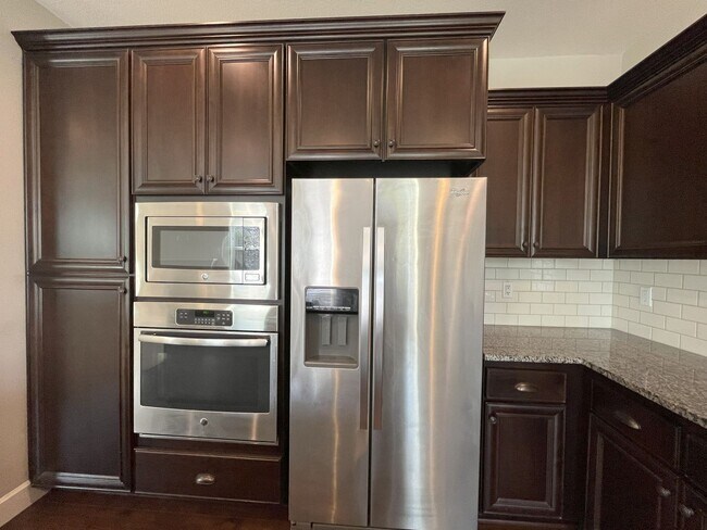 Building Photo - Spacious 4-Bedroom + Bonus Room with Modern Kitchen, Solar Panels & Private Fenced Backyard!