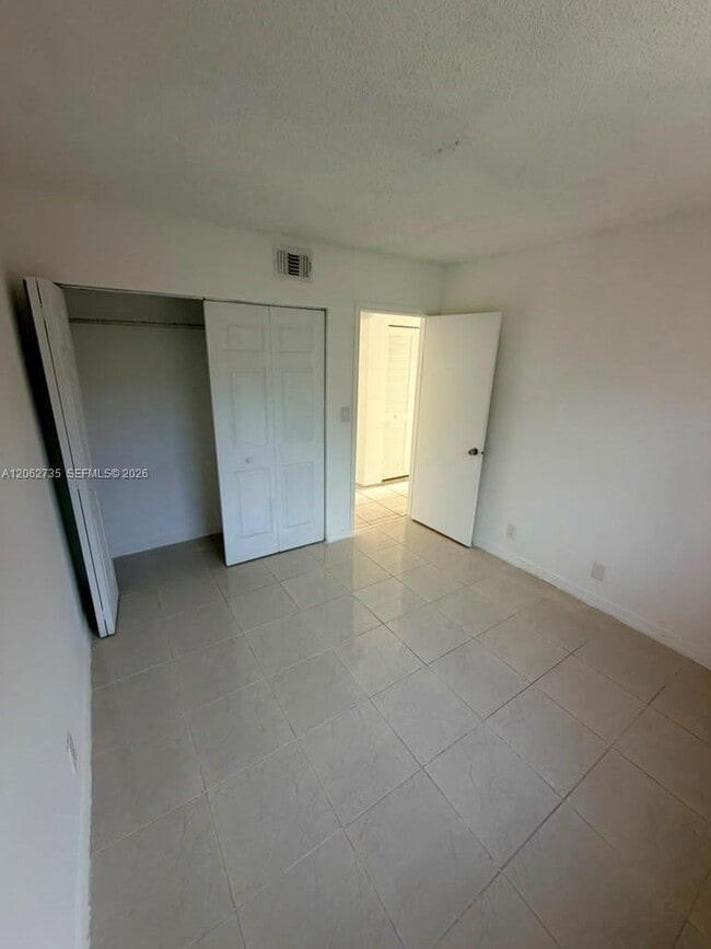 Building Photo - 12193 Royal Palm Blvd