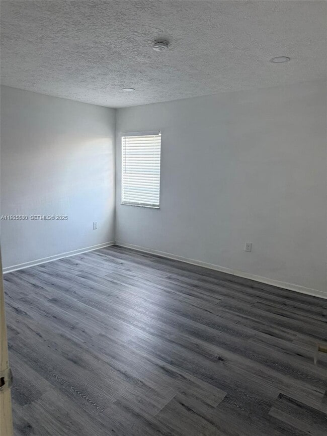 Building Photo - 6070 W 18th Ave