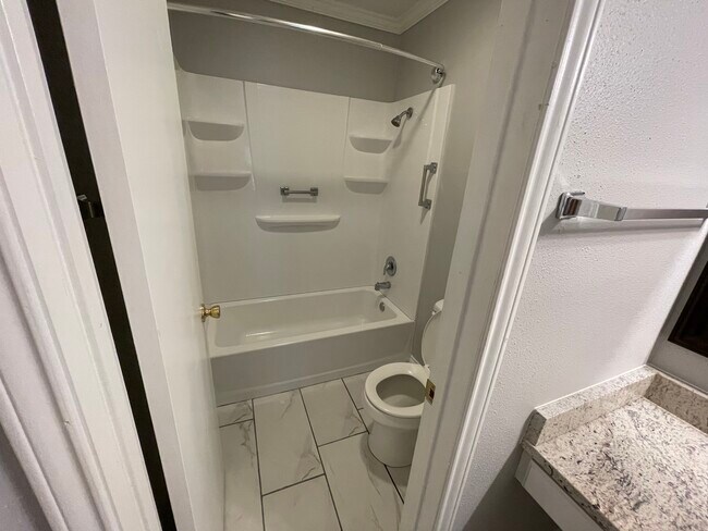 Building Photo - The Gardens Condos