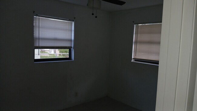 Bedroom 2 Canal view - 211 Sandy Cir