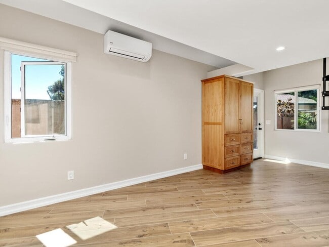 Building Photo - Studio with Loft, Private Patio, and All U...