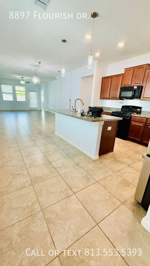 Building Photo - 8897 Flourish Dr.