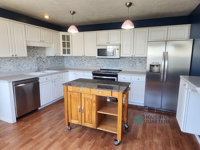 Building Photo - Spacious 4-Bedroom Home in Spokane Valley with Finished Basement & Fenced Yard