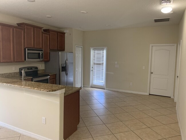 Building Photo - 6819 Goldflower Ave