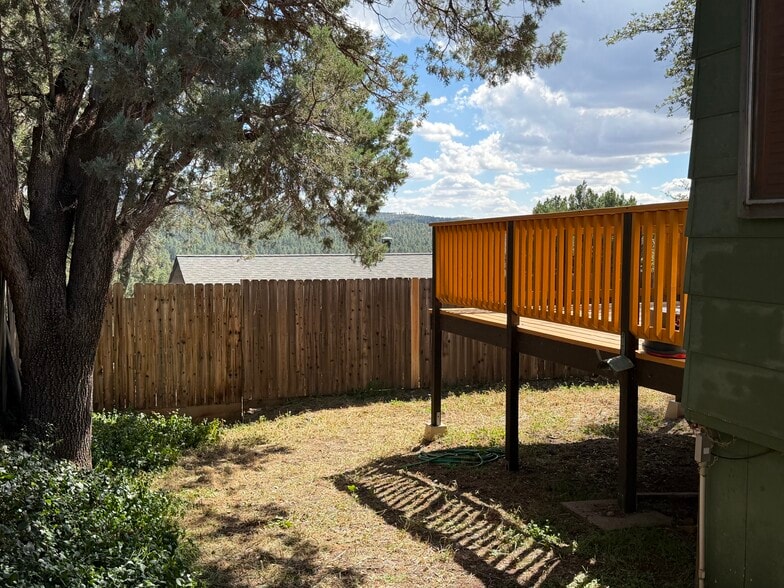 Enclosed back yard with views to the south. - 491 E Juniper Dr