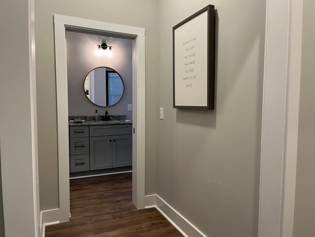 Access to full bathroom via hallway when entertaining guests. - 513 S Main St