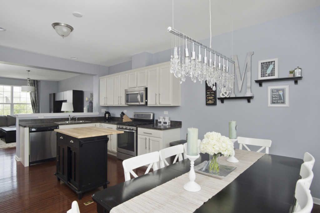 Dining Area. Dining table and chairs furnished - 15353 Sheffield Square Pkwy