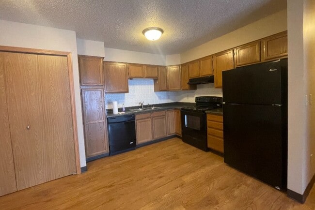 One Bedroom Kitchen View - Crosby Country Apartments
