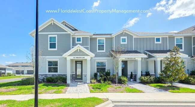 Building Photo - EXCEPTIONAL AND SPACIOUS FURNISHED TOWNHOME WITHIN WATERSIDE- NAUTIQUE!