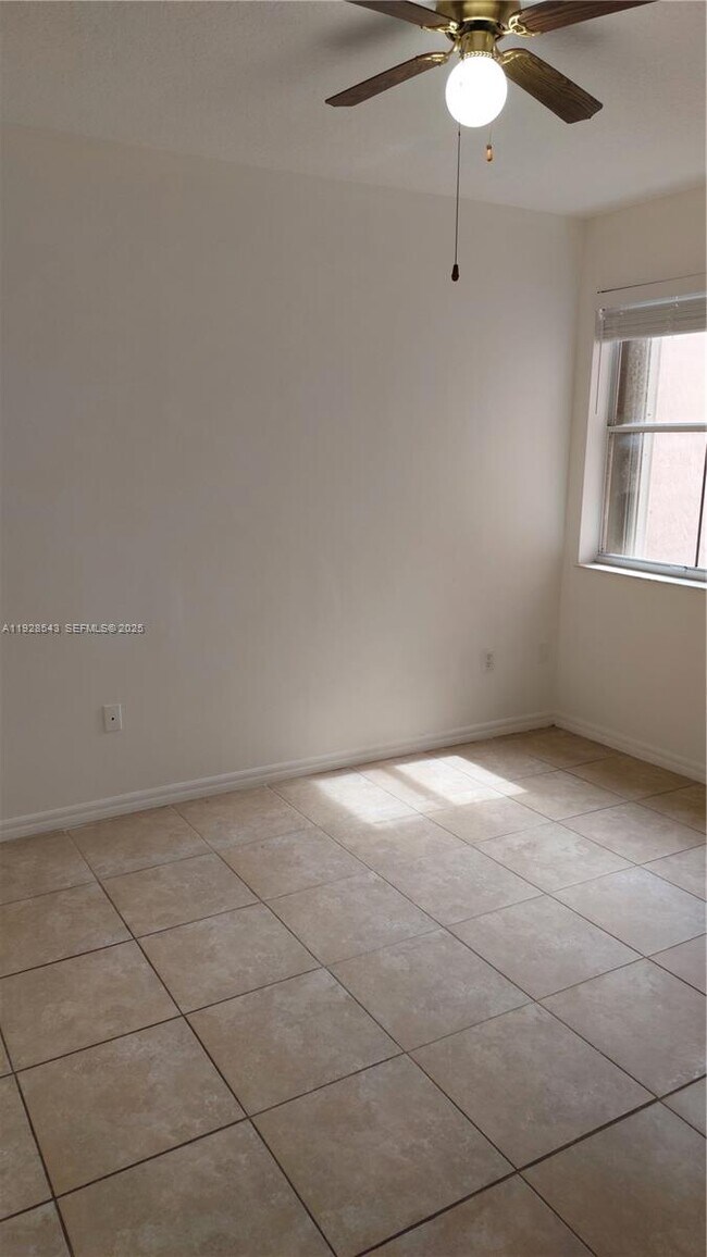 Building Photo - 6560 NW 114th Ave