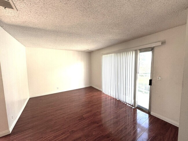 Building Photo - 2 Bedroom, 2 Bath Upstairs Condo with Private Balcony & 2-Car Garage, Gated Community, Water/Tras...