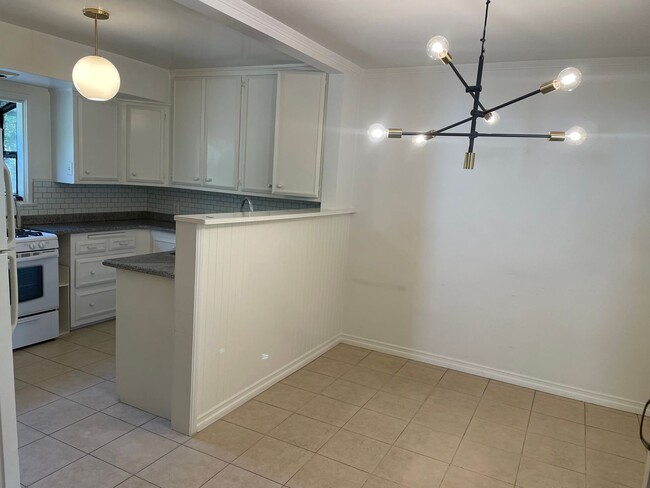 Building Photo - Charming 3-Bedroom Home with Gardener Serv...