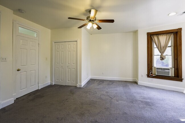 Building Photo - Historic & Charming 3BR Rowhouse near Howard is Move-in Ready!