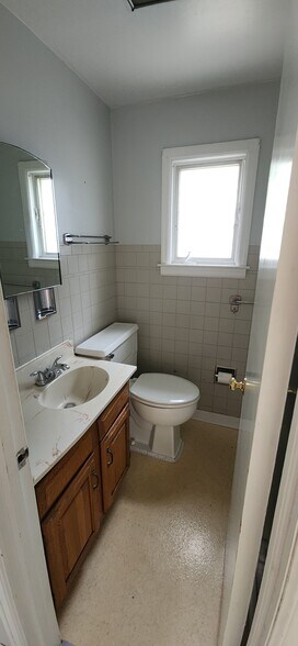 Half bath downstairs - 104 E 2nd St