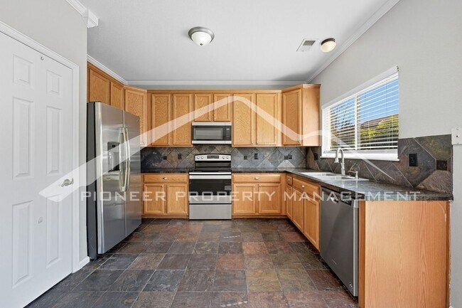 Building Photo - Spacious Home with Central AC and Washer/D...