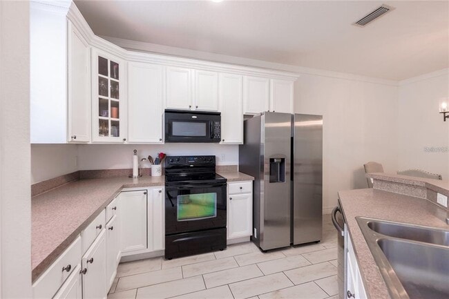 Building Photo - 14128 Avenue of the Groves