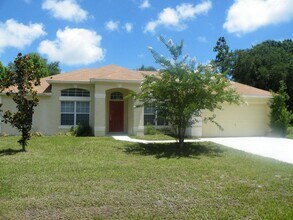 Building Photo - Spacious 4-Bed, 2-Bath Home in Palm Coast