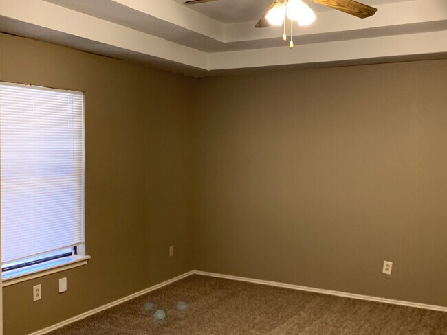 Building Photo - Spacious South Lubbock Townhome with Bonus Space & 2-Car Garage