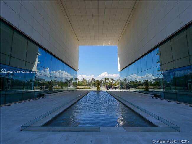 Building Photo - 10201 Collins Ave