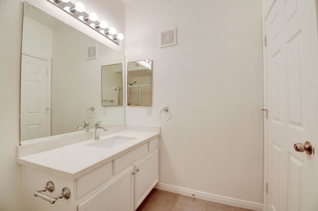 Building Photo - Gated, beautiful, and safe in a secure community