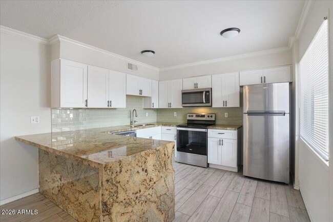 Building Photo - 6528 N 17th Ave