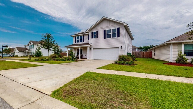 Building Photo - 5 Bedroom / 3 Bathroom Home  in Hammock Bay w/Fenced in Yard