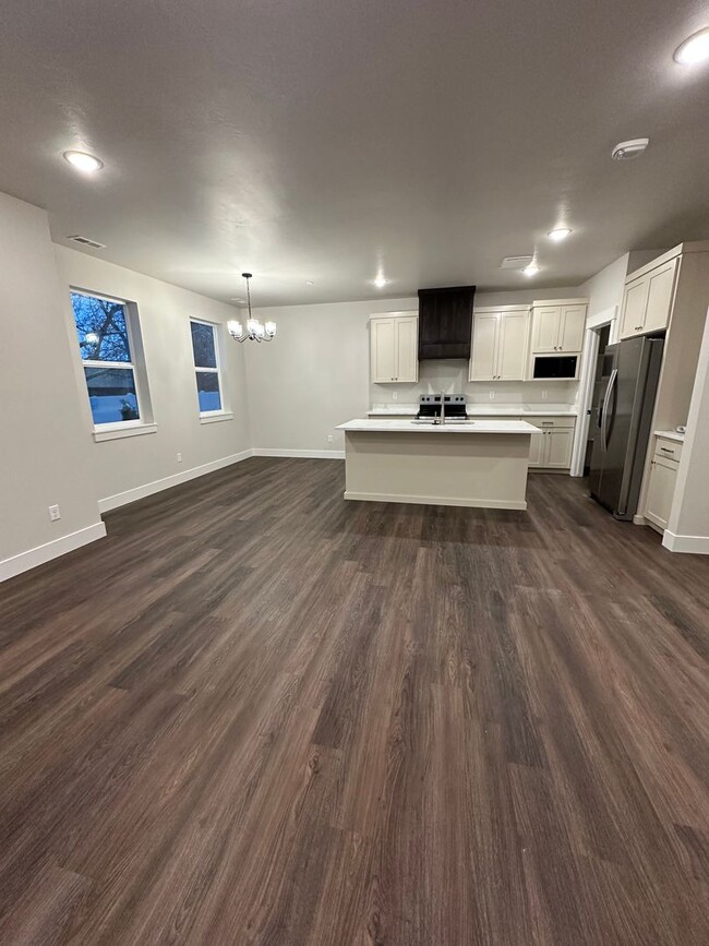 Building Photo - Stunning New 4 Bedroom Townhome in Idaho F...