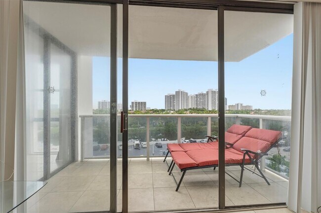 Building Photo - 3675 N Country Club Dr