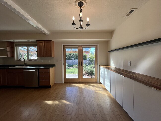 Building Photo - Light-Filled Home with Open Layout, Modern...
