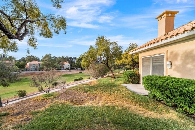 Building Photo - Charming Guard-Gated Southwest Las Vegas Townhome with Fireplace & Golf Course Views!
