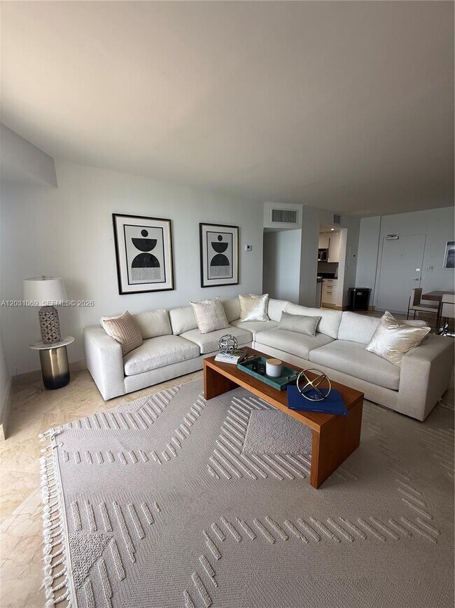 Building Photo - 10275 Collins Ave