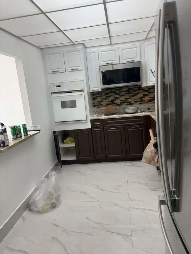 Building Photo - 19390 Collins Ave