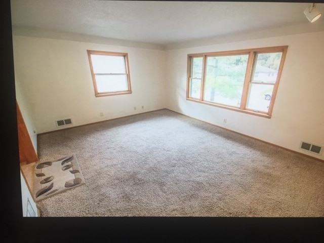 Living room, large picture window. - 1113 9th Ave S