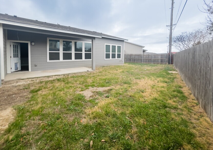 Covered patio and private backyard. - 108 Bailey Kay