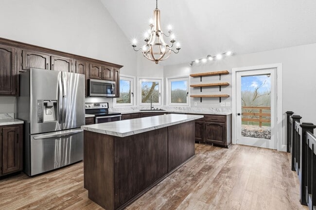 Building Photo - Luxury Living on the River — Your Dream Home Awaits