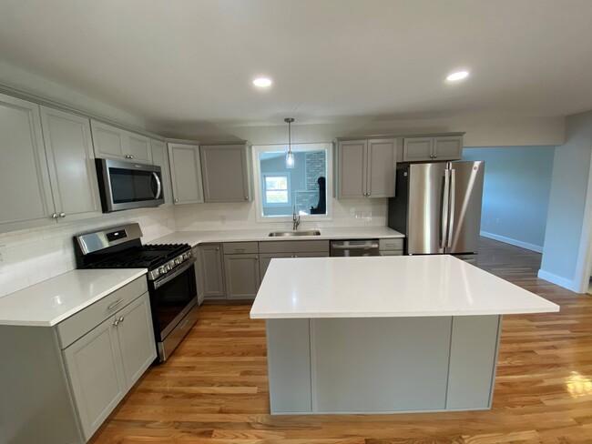 Kitchen with Breakfast Bar - 3299 Mohawk St