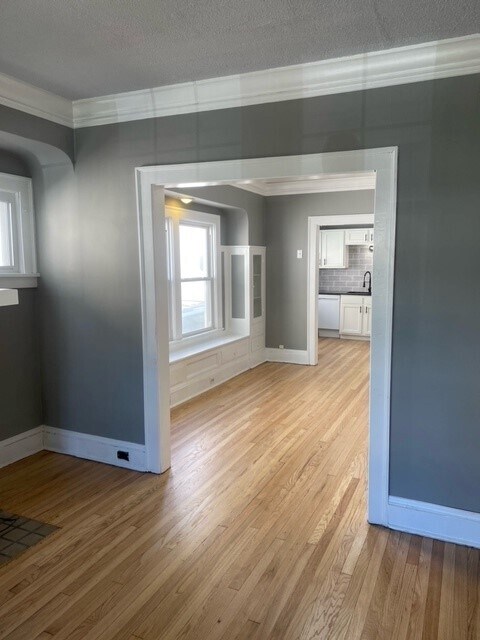 Front room into dinning room. - 2075 Lewis Dr