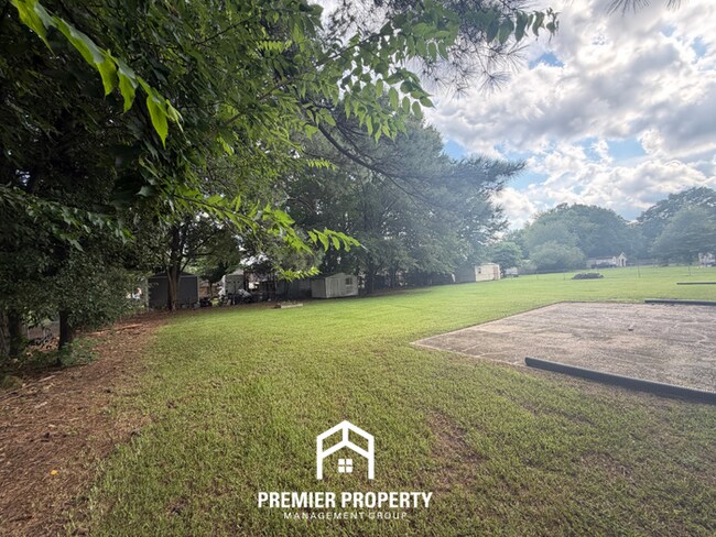 Building Photo - Charming 3BR/2BA Northport Home with Hardwood Floors & Brick Fireplace!